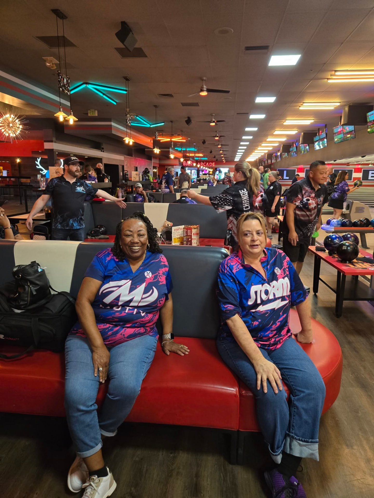 League bowlers relaxing in the seating area